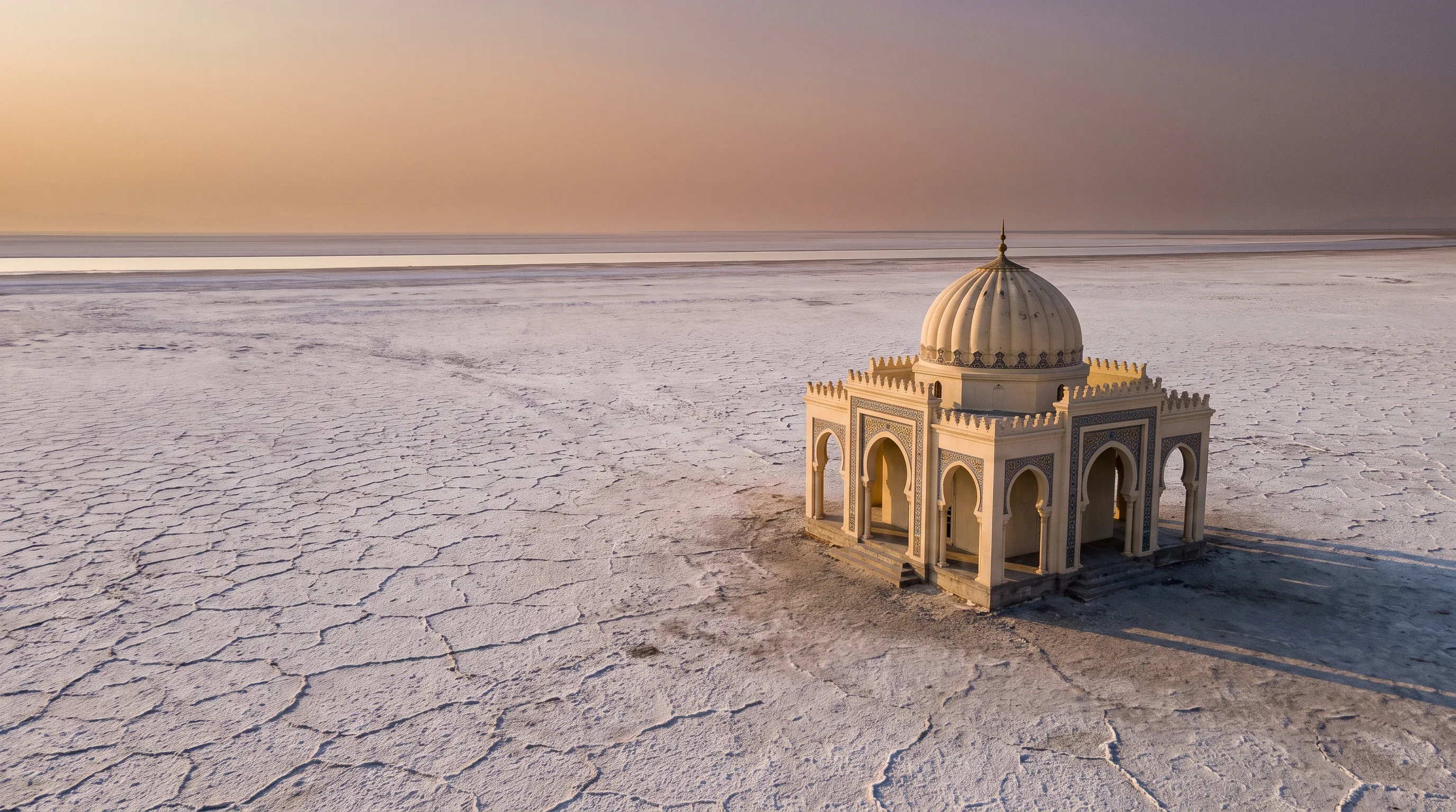A cream-domed lakeside pavilion building standing on the edge of the Great Salt Lake's dry, cracked salt flats at golden hour, distant water barely visible on the horizon.
